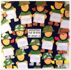 a bulletin board with paper cut out of people and the words honoring the brave by troop