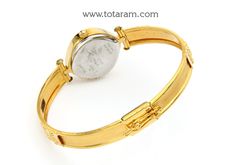 22 Karat Gold Watch - Titan Raga Watch - Womens Gold Watch
  Diameter of the watch dial : 0.90 inches
  Please Note: The dial of the watch is NOT made of Gold, only the strap connecting (joining) the watch is made of Gold


Introducing the exquisite 22 Karat Gold Watch from Totaram Jewelers, a renowned brand known for its exceptional craftsmanship. This Titan Raga Watch is a true symbol of elegance and sophistication, designed especially for women who appreciate the beauty of gold je Gold Round Watch With Subdials, Gold Engraved Watch Accessories With Round Dial, Gold Timeless Watch With Rotating Bezel, Timeless Gold Watches With Rotating Bezel, Gold Diamond Watch With Rotating Bezel For Anniversary, Gold Engraved Diamond Watch For Anniversary, Gold Round Watches For Anniversary, Engraved Gold Diamond Watch For Anniversary, Gold Diamond Watch With Round Dial For Anniversary