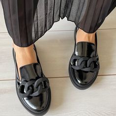 Introducing our exquisite collection of women's handmade loafers, a perfect blend of timeless elegance and modern comfort.  These classic black leather shoes are meticulously crafted with care and attention to detail, making them the ideal choice for any stylish woman.  Our penny loafers for women feature a sophisticated buckle detail that adds a touch of refined charm to these slip-on shoes.  Made from premium quality patent leather, these black loafers are not only durable but also exude an un Elegant Slip-on Platform Loafers For Office, Elegant Loafers With Rubber Sole And Round Toe, Elegant Flat Platform Loafers For Work, Elegant Flats With Brogue Detailing For Fall, Elegant Brogue Flats For Fall, Elegant Fall Flats With Brogue Detailing, Elegant Platform Loafers With Round Toe For Office, Elegant Round Toe Platform Loafers For Office, Elegant Flat Oxfords With Brogue Detailing