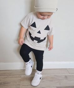 Gender neutral Halloween short sleeve tee! Brand- Bella & Canvas BODYSUIT SIZES: 0-3 months  3-6 months 6-12 months 12-18 months T-SHIRT SIZES: 2T 3T 4T COLOR OPTIONS: Heather dust with black heat transfer vinyl  Exchanges & Returns: I do not accept returns or exchanges on any personalized items unless it is a mistake on our end.  Please make sure you read the description and sizing of all items before checking out. Also make sure to follow all instructions while checking out. Any information that is not provided when you check out will delay your delivery.  Please check your messages in Etsy or the email notifications you receive for any questions I have for you so I can make sure your purchase is made exactly as you would like!  Please contact me directly if you have any issues or concer Playful T-shirt For Fall Playtime, Playful T-shirt For Playtime In Fall, Cotton T-shirt For Playwear In Fall, Cute Fall T-shirt For Playtime, Fall Playtime Tops With Short Sleeves, Halloween Playful Short Sleeve T-shirt, Playful Short Sleeve T-shirt For Halloween, Playful Short Sleeve T-shirt For Fall, Playful Short Sleeve Fall T-shirt