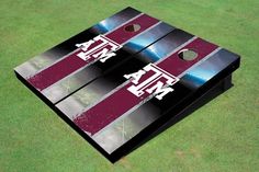 texas a & m aggies cornhole game set on green grass with space for text