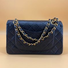 Chanel 24K Gold Classic Flap medium size X89453 Product Details Size: W25 x H16 x D6.5 CM Color：black Accessory: dust bag, card Condition: very good Sub-category: Shoulder bag&Crossbody bag Please Note: All products in our store are second-hand and vintage. ITEM LOCATION IS CANADA. Duties are set by the destination country/province's customs authorities. We are not responsible for paying any duties. These are the actual photos of the item. This item was cared for by a previous owner. Due to its High-end Travel Shoulder Bag With Cc Turnlock Closure, Classic Business Flap Bag With Dust Bag, Classic Bags With Cc Turnlock Closure For Shopping, Elegant Double Flap Shoulder Bag For Shopping, Timeless Luxury Everyday Bag With Flap, Classic Gold Bag With Cc Turnlock Closure, Gold Double Flap Shoulder Bag For Evening, Classic Travel Bag With Cc Turnlock Closure, Gold Double Flap Evening Shoulder Bag