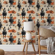 a wallpaper with horses and sunsets on it in a living room or bedroom