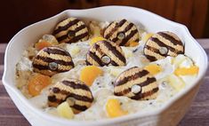 a bowl filled with food on top of a wooden table