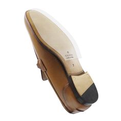 Keep your Gucci loafers looking flawless without sacrificing their iconic style or elegant feel with Sole Guard. We offer precisely cut, invisible protectors that shield your leather soles from everyday wear and tear. With these easy-to-use guards, you can enjoy confident walks and extend the lifespan of your luxurious footwear. Invisible Shield: Transparent material blends seamlessly with your shoe soles and maintains the aesthetics of your loafers. Confident Wear: Gucci Loafers Sole Guard is d Classic Closed Toe Slip-ons With Rubber Sole, Slip-resistant Round Toe Business Loafers, Leather Slip-resistant Closed Toe Loafers, Slip-resistant Leather Loafers With Closed Toe, Slip-resistant Leather Closed Toe Loafers, Business Slip-resistant Round Toe Loafers, Classic Slip-resistant Slip-ons For Business, Classic Monk Strap Shoes With Flat Rubber Sole, Classic Slip-ons With Ortholite Insole And Flat Heel