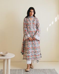 "Introducing vibrant and fashionable printed cambric shirt with dupatta perfect for adding a touch of elegance and style to your wardrobe. Made from high-quality cambric fabric, this shirt offers comfort and breathability, making it an ideal choice. Length : 45\" Dupatta Fabric : Chiffon  Pants Fabric : Printed Cambric" Unstitched Floral Cotton Anarkali Set, Unstitched Cotton Anarkali Set With Floral Print, Floral Print Mulmul Salwar Kameez With Straight Kurta, Anarkali Cambric Kurta With Floral Print, Anarkali Floral Print Cambric Kurta, Anarkali Kurta With Floral Print, Cotton Floral Print Dupatta For Eid, Eid Cotton Dupatta With Floral Print, Unstitched Block Print Lawn Suit With Straight Kurta