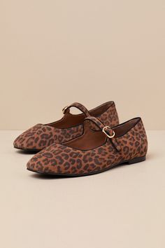 You'll channel sweet and chic vibes every time you step into the Seychelles Magnolia Tan Leopard Suede Leather Buckle Ballet Flats! Genuine suede leather, with a cute leopard print throughout, shapes these Mary Jane-inspired flats with a rounded-toe upper, a low-cut collar, and a slender strap that secures with a gold buckle at the vamp. 0. 5" rubber sole. Lightly cushioned insole. Nonskid rubber sole. Genuine leather upper, lining, and sock. Balance man made materials. Imported. Lulus | Magnoli Chic Brown Suede Flats, Chic Brown Ballet Flats With Round Toe, Chic Brown Round Toe Ballet Flats, Buckle Ballet Flats, Cute Leopard, Chic Vibes, Leather Buckle, The Vamps, Leather Flats