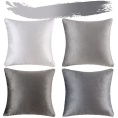 four silver and white pillows on a white background