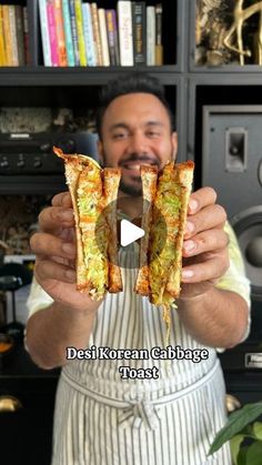 a man holding two pieces of pizza in his hands