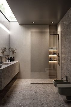 a modern bathroom with two sinks and a shower