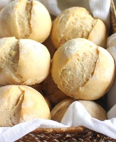 a basket filled with loaves of bread