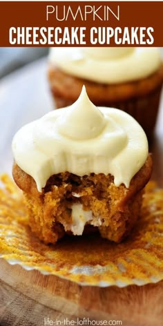 pumpkin cheesecake cupcakes with white frosting on top