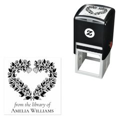 a black and white heart stamp with the words from the library of amelia williams on it