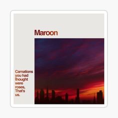 the cover art for maroon's new album, surrounded by silhouettes of city buildings