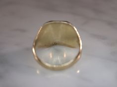 Herff Jones Art Deco style 10k yellow gold ring is size 7. Band tapers from 15mm to 3mm with beveled plaque on top. Plaque design consists of a shield with the name of the school engraved on it, which is too worn to see. Bevels are decorated with geometric patterns and engraved with the letters D and J. The sides of the ring have the numbers 19 and 36 incised into them, all in a high polish finish. Stamped HJ.CO SUPERTONE PATENTED. Classic Gold Octagon Signet Ring, Classic Octagon Signet Ring With Polished Finish, Art Deco Rectangular Signet Ring With Polished Finish, 14k Gold Signet Ring With Polished Finish, 14k Gold Art Deco Signet Ring With Polished Finish, Octagon Signet Ring With Polished Finish For Anniversary, Art Deco Gold Signet Ring With Polished Finish, Collectible Art Deco Signet Ring With Polished Finish, Gold Signet Ring With Polished Finish