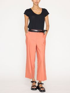 Runs true to size Relaxed fit Wide, cropped silhouette Mid-rise Deep, hem pant cuffs Fly front with zipper and hook and bar fastening Elasticized back waistband Slant side pockets Back welt pocket with grosgrain detail Belt loops 25” Inseam 27% Linen/25% Cotton/30% Polyester/16% Rayon/2% Spandex Imported Our relaxed, Lena Cropped Pants are the epitome of effortlessness with a touch of sophisticated ease. In a mid-rise, wide, crop leg silhouette, they have that soft Brochu Walker sensibility coup Spring Wide Leg Cropped Pants With Side Pockets, Workwear Bottoms With Cropped Leg And Relaxed Fit, Relaxed Fit Cropped Leg Workwear Bottoms, Workwear Bottoms With Relaxed Fit And Cropped Leg, Wide Leg Cropped Pants With Belt Loops For Work, Cropped Wide Leg Pants With Belt Loops For Work, Tailored Pants With Patch Pockets For Spring, Fitted Cropped Leg Pants With Side Pockets, Fitted Cropped Pants With Side Pockets