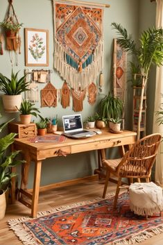 a laptop computer sitting on top of a wooden desk in front of potted plants