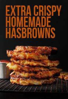 a stack of homemade hash browns sitting on top of a metal rack with the words extra crispy homemade hash browns