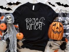 Basic Witch Tshirt, Halloween Graphic Tee, Witchy Tshirt, Unisex Jersey Short Sleeve Tee *Bella + Canvas short sleeve unisex tees are made from cotton and polyester. Solid colors - 100% cotton Heather colors - 52% cotton, 48% polyester Athletic Heather - 90% cotton, 10% polyester *Our designs may be available on multiple products, (e.g. t-shirts, sweatshirts, etc.) so please be sure the listing you are ordering from is the correct item. Keep in mind when ordering that sizing in unisex. *Please allow 2-7 business days for processing plus 2-5 business days for standard U.S. shipping. Unfortunately we are not able to guarantee shipping dates. *Because items are made to order, we cannot accept returns for change of mind. However, if your items comes damaged or with a manufacturing error, pleas Witchy Tshirt, Basic Witch Shirt, Witch Tshirt, Basic Witch, Halloween Graphic Tees, Halloween Graphic, Halloween Witch, Halloween Tshirts, Jersey Shorts