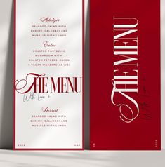 a red menu with white lettering on the front and back, along with an elegant calligraphy font