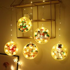 lighted christmas ornaments hanging from the ceiling