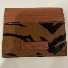 4x31/4” Approximately With Several Pockets On Each Side And In The Middle. Nwot And Great Condition. Pebbled Leather And Calfhair In A Classic Zebra Print. Super Cute And Functional! Casual Brown Rectangular Card Holder, Casual Brown Card Holder With Rfid Blocking, Casual Brown Card Holder, Madewell Sunglasses, Madewell Accessories, Silk Noil, Leather Key Fobs, Large Scarf, Pink Paisley