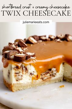 a slice of cheesecake with caramel drizzle and nuts is on a white plate