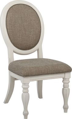 a white chair with a brown upholstered seat and back cushion on top of it