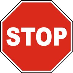 a red stop sign with white letters on it