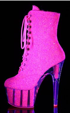 7" Heel, 2 3/4" PF Glitter Ankle Boot, Blacklight ReactiveHEEL/PLATFORM : 7" Heel, 2 3/4" PFFIT GUIDE : True to sizeVEGAN : YesSIZE: US women's sizing Nike High Heels, Glitter Ankle Boots, Jorge Gonzalez, Princess Barbie Dolls, Glitter Boots, Pleaser Shoes, Pink Outfits, Lace Up Heels, Pink Glitter