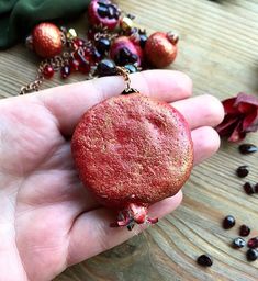 "Original pomegranate garnet necklace Garnet jewelry Luxury necklace Art fruit necklace Gift for women Gift for grandmom January birthstone This necklace already sold but i can make the same for your order Original bright garnet necklace with juice polymer clay pomegranate with natural garnet seeds and also with garnet beads, golden hematite beads and red crystal glass. Pomegranate looks very realistic and juice. Garnet is a stone for those who were born in January Perfect for your unique bright Nature-inspired Necklaces With Charms For Gifts, Handmade Garnet Pendant Necklace, Artisan Red Necklace For Gift, Red Nature-inspired Jewelry For Gifts, Garnet Pendant Necklace Gift, Garnet Pendant Necklace For Gifting, Garnet Pendant Necklace For Gift, Garnet Pendant Necklaces For Gift, Artisan Pendant Charm Necklace For Gift