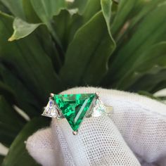 Green Emerald 4.50 Carat Ring, 925 Sterling Silver, Triangle Shape Stone. Handmade Ring Anniversary Gift. Estimated delivery North America: 2-3 weeks Europe: l-3 weeks Australia, New Zealand and Oceania: 2-3 weeks Asia Pacific: 2-3 weeks Latin America and the Carib beast: 2-3 weeks Sub-Saharan Africa: 2-3 weeks I'll do my best to meet these dispatch estimates, but can't guarantee them. Actual delivery time will depend the delivery method you choose. Gia Certified Silver Emerald Ring As Gift, Anniversary Rings In Sterling Silver, Green Trillion Cut Ring Gift, Gia Certified Silver Emerald Ring For May Birthstone, Green Trillion Cut Promise Ring, Trillion Cut Emerald Ring In White Gold For Gift, Ring For Men, Green Emerald, Triangle Shape