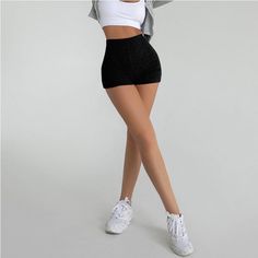 The Emes Shop shorts is detailed with a high waisted fit and a ribbed surface. Features a soft and stretchy material and can be worn for either workouts or a casual athleisure wear. MATERIAL: 80% Nylon. 20% Cotton BlendMEASUREMENTS: X-Small Waist: 21.33"- 22.8 in Hips: 28.3" in Length: 12.2" in Small Waist: 22.8" - 24" in Hips: 29.9" in Length: 12.6" in Medium Waist: 24"-25.5" in Hips: 31" in Length: 13" in Sporty High Waist Bottoms With Built-in Shorts, Stretch High-waisted Athletic Shorts For Gym, High Stretch Ribbed Summer Bottoms, High Stretch Ribbed Bottoms For Summer, Ribbed High Stretch Bottoms For Summer, Stretch Gym Shorts With Ribbed Waistband, Sporty Ribbed Yoga Bottoms, Stretch Athletic Shorts With Ribbed Waistband, High-waist High-stretch Athletic Shorts