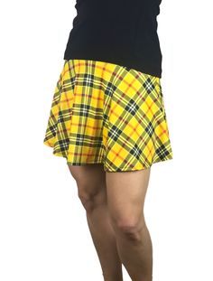 Step up your game in this fun and colorful athletic skirt with built in compression shorts and pocket. This golf, tennis, running or sports skirt is flare-style, allowing for plenty of movement, made of a yellow plaid high quality performance spandex. The compression shorts are uniquely designed to be incredibly comfortable and won't ride up during activity. The pocket is positioned on the side of the shorts, and will fit your phone, keys, ID, etc. *Please see size chart in images above for stan Sports Skirt, Running Skirt, Athletic Skirts, Outfits Athletic, Womens Athletic Outfits, Running Skirts, Running Costumes, Athletic Skirt, Yellow Skirt