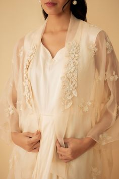 Blush peach organza short jacket with cutdana embroidery. Comes with a draped gown and an inner. - Aza Fashions Jacket With Gown, Cutdana Embroidery, Peach Gown, Organza Jacket, Draped Gown, Drape Gowns, Gown For Women, Open Neck, Ladies Gown