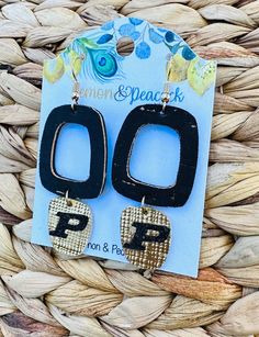 "Beautiful handmade geometric black and gold Purdue leather earrings. A unique twist on a classic double dangle look! Perfect for Purdue game days! Be sure to check out all of my other listings for Purdue earrings! Fun statement earrings for every Purdue fan! Boiler Up! FREE SHIPPING on all orders $35+, discount automatically applied at checkout! LOCALS: If you would like to pick your order up from my home in Oxford, Indiana - please use code \"LOCALPICKUP\" to eliminate the shipping charge." Order Up, Gold Leather, Leather Earrings, Black And Gold, My Home, Statement Earrings, Indiana, Jewelry Earrings Dangle, Etsy Earrings