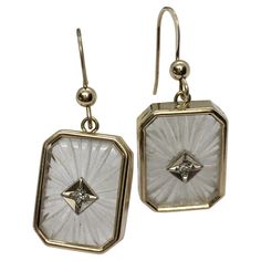 Art Deco Style 14k Yellow Gold Camphor Glass Diamond Earrings Weighting 5.1 Gram 14K gold Dimensions 17mm by 13 mm Hangs about one inch Two single cut diamonds weighting .03 Carat in total Gold Art Deco Earrings, Art Deco Inspiration, Jewelry Chest, Art Deco Stil, Estilo Art Deco, Art Deco Earrings, One Inch, Glass Earrings, Art Deco Style