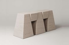 three concrete blocks stacked on top of each other