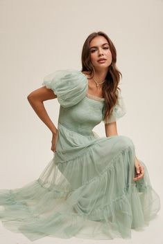 Beautiful tulle mint green dress with smocked bodice, with fun puff sleeves, ruffle detailing, elastic waistband and square neckline. Self and Lining 100% Polyester Hand wash in cold water. Aprox. measurements in inches: S:Length of self-46, length of lining-42 |Bust-28 |Waist-26 M:Length of self-47, length of lining-42.5 |Bust-30 |Waist-28 L:Length of self-47, length of lining-43 |Bust-32 |Waist-29 modest dresses, modest dress, modest midi, modest maxi, modest fashion, modest trendy dresses, mo Semi Modest Dresses, Modest Tulle Dress, Modest Graduation Dresses, Formal Christmas Dress, Modest Prom Dress, Modest Prom Dresses, Modest Midi Dress, Modest Formal Dresses, Nursing Friendly Dress