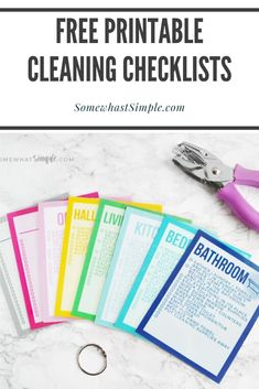 the free printable cleaning checklist is on top of a marble counter with scissors