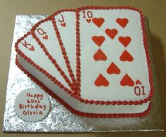 a birthday cake with playing cards on it