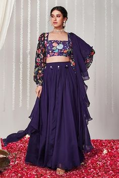 Purple pleated lehenga with tassel embellishment on the waistline. Paired with a floral print blouse with balloon sleeves and draped organza dupatta. - Aza Fashions Pleated Lehenga, Pleated Set, Lehenga And Blouse, Purple Lehenga, Blouse Cotton, Organza Dupatta, Floral Print Blouses, Print Blouse, Embroidered Silk