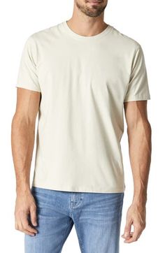 Sure to be a wardrobe favorite, this smooth and stretchy T-shirt features a classic fit and a naturally-dyed neutral hue that will look good all year 'round. 21" length Crewneck Short sleeves 48% organic cotton, 48% modal, 4% elastane Machine wash, dry flat Made in Turkey Beige Relaxed Fit Plain T-shirt, Basic Cream T-shirt For Everyday, Neutral Relaxed Fit Crew Neck T-shirt, Casual Cotton T-shirt In Neutral Color, Beige Relaxed Fit Basic T-shirt, Basic Beige Relaxed Fit T-shirt, Beige Plain T-shirt With Relaxed Fit, Casual Plain Beige T-shirt, Basic Beige T-shirt With Relaxed Fit