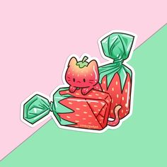 a pink and green sticker with an image of a cat in a strawberry box