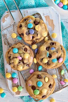 chocolate chip cookies with m & m eggs on a cooling rack