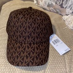 Brand New With Tags. Gorgeous Michael Kors Brown Cap: Retail: $68 Plus Tax Brown Baseball Cap, Michael Kors Accessories, Baseball Cap, Baseball Hats, Michael Kors, Women Accessories, Baseball, Brand New, Tags