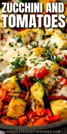 zucchini and tomatoes with cheese sauce in a skillet on the stove top