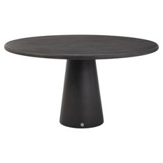 a round table with black base on white background