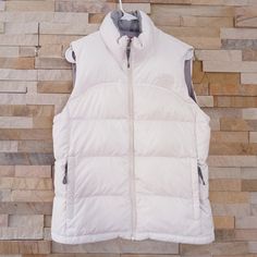 North Face Womens Small White Nuptse Vest Jacket 700 Down Winter Puffer Ladies Product Details Brand - The North Face Material - 700 Goose Down Insulation Color - White Size - Women's Small Condition - Excellent Style - Heavy Winter Puffer Vest Retail Price - $325 Measurements Top To Bottom Length - 25" Pit To Pit - 20" A1499 (Id-18-1743) Nuptse Vest, Winter Puffer Vest, Winter Puffer, North Face Coat, North Face Womens, North Face Women, North Face Jacket, Puffer Vest, Woman Colour