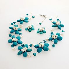 "Material: Howlite Turquoise ,Fwpearl Bead size: 4mm-6mm-8mm-10mm,15*15mm,15*20mm,20*30mm Necklace size: 18\" + 2\" extension chain Color:As show Packing: Beautiful Pouch All items in my shop are made to order. Most of the time it takes 1-3 business days but can be longer at times and for larger orders. If you want to order of different style. Please contact me . ----------------------------------------------------- Please feel free to convo me should you have any question! Thank you! :)" Turquoise Flower-shaped Jewelry With Matching Earrings, Turquoise Flower-shaped Jewelry For Wedding, Turquoise Flower Jewelry For Wedding, Turquoise Flower-shaped Wedding Jewelry, Turquoise Flower-shaped Jewelry Gift, Handmade Turquoise Flower-shaped Jewelry, Boyfriend Girlfriend Necklaces, Pearl Flower Earrings, Birthstone Necklace Mothers